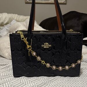Coach Signature Embossed Black Satchel with Gold Hardware